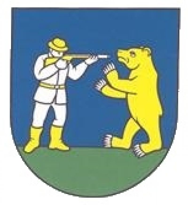 Erb obce Liptovská Lúžna, na ktorom je medveď a poľovník 